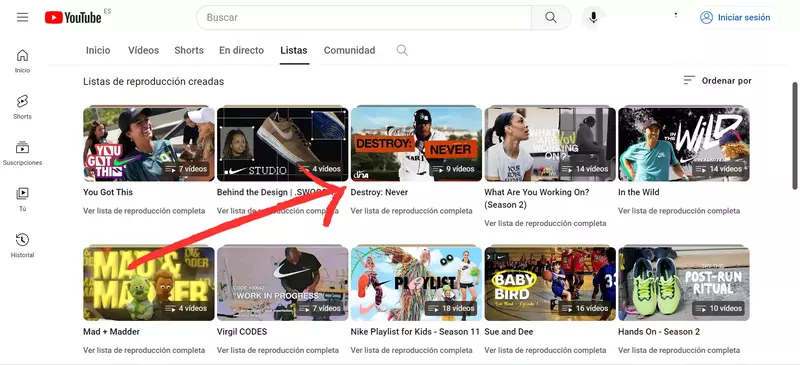 Captura con flecha señalando listas de reproducción