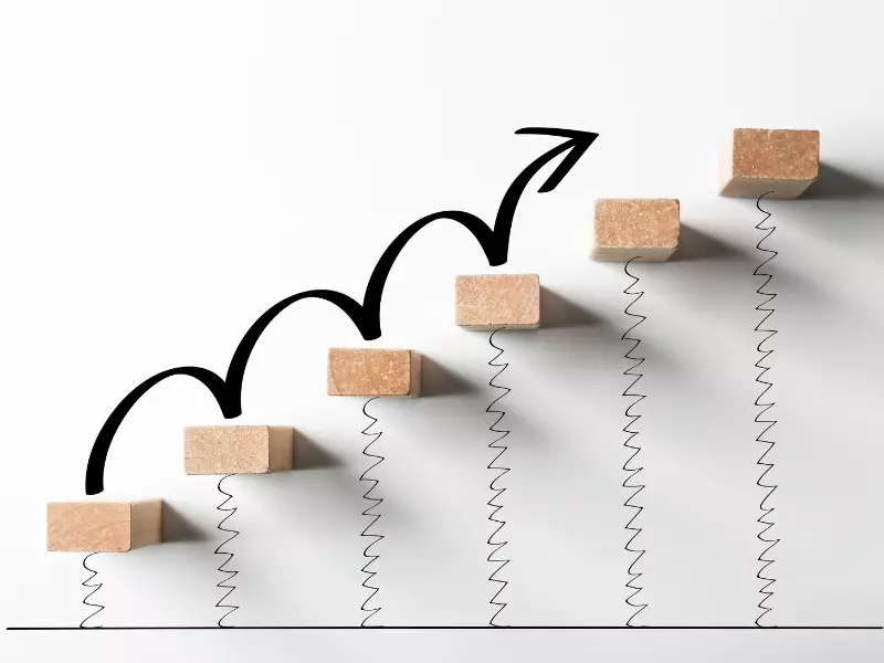 Escaleras y representación de superación profesional